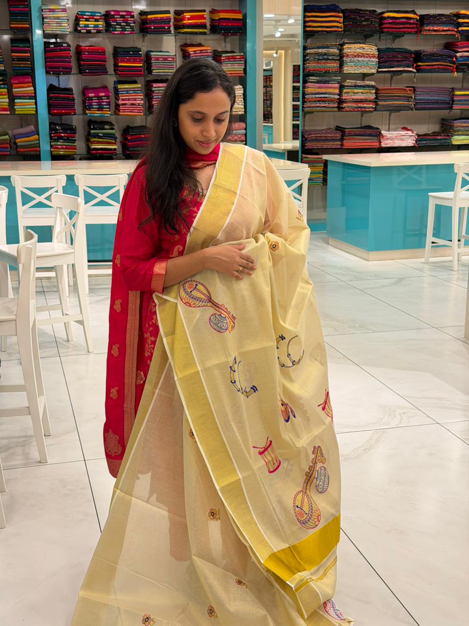 Kerala Tissue Veena Embroidery Saree SL302