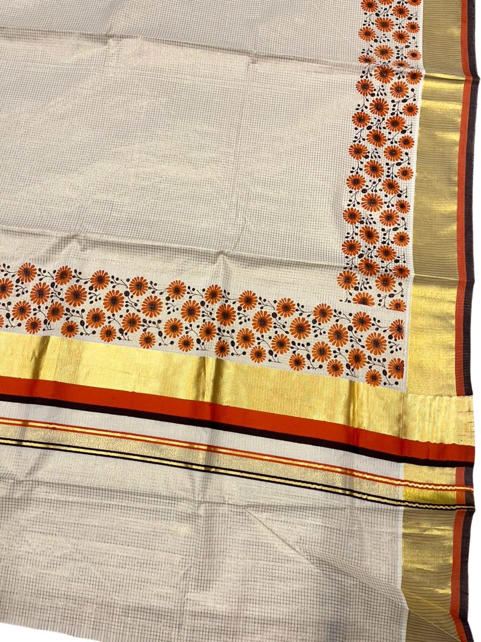 Southloom Kerala Cotton Kasavu Saree with Micro Check And Floral Design on Body In Orange And Black Border