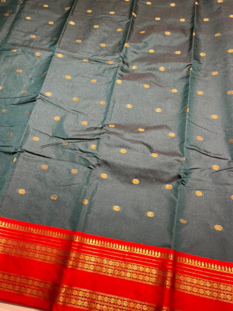 Southloom Semi Silk Narayan Pett Saree with Butta Works Across Body in Dark Green