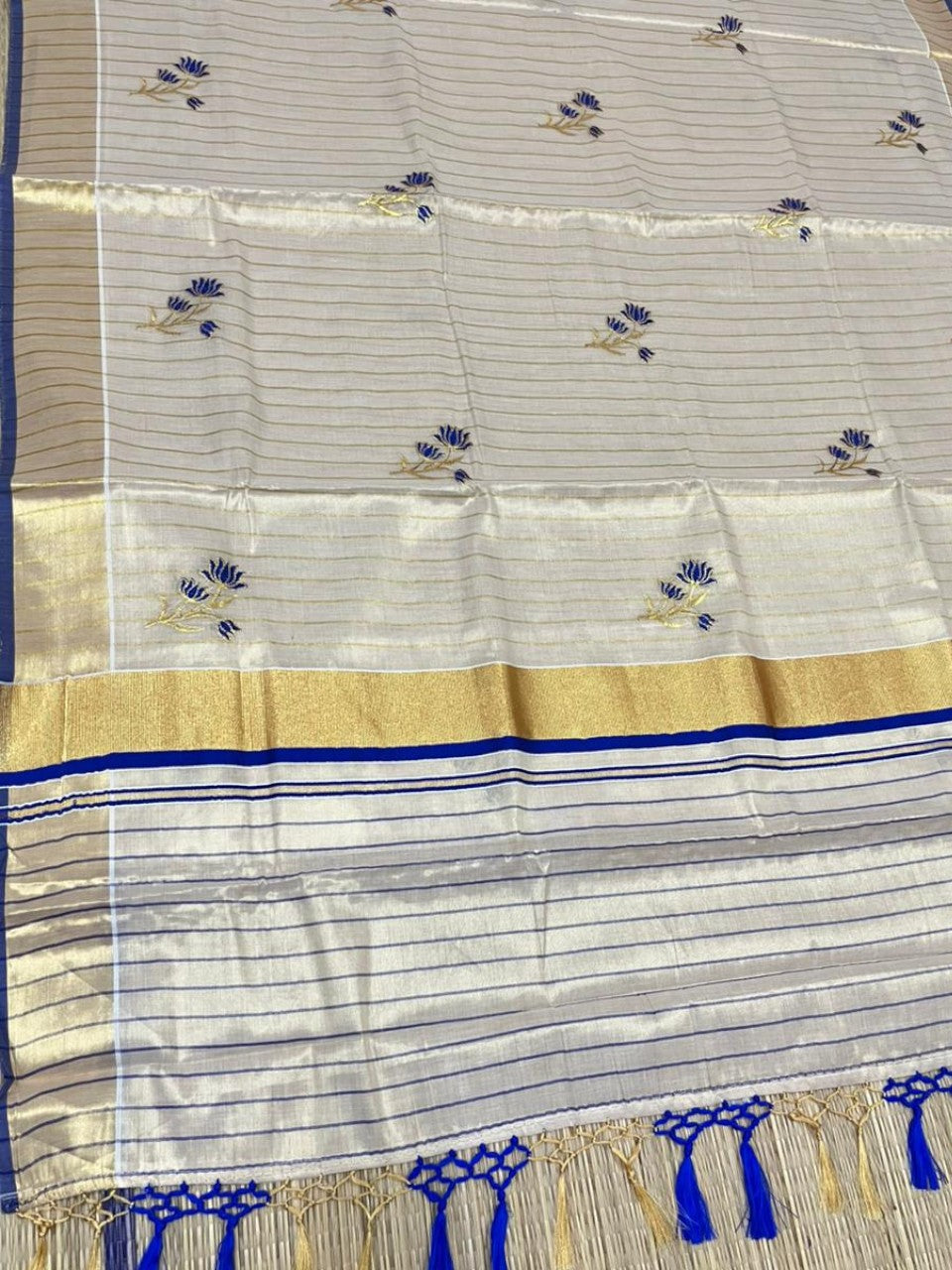 Kerala Tissue Saree With Blue Floral Embroidery Design In SL249