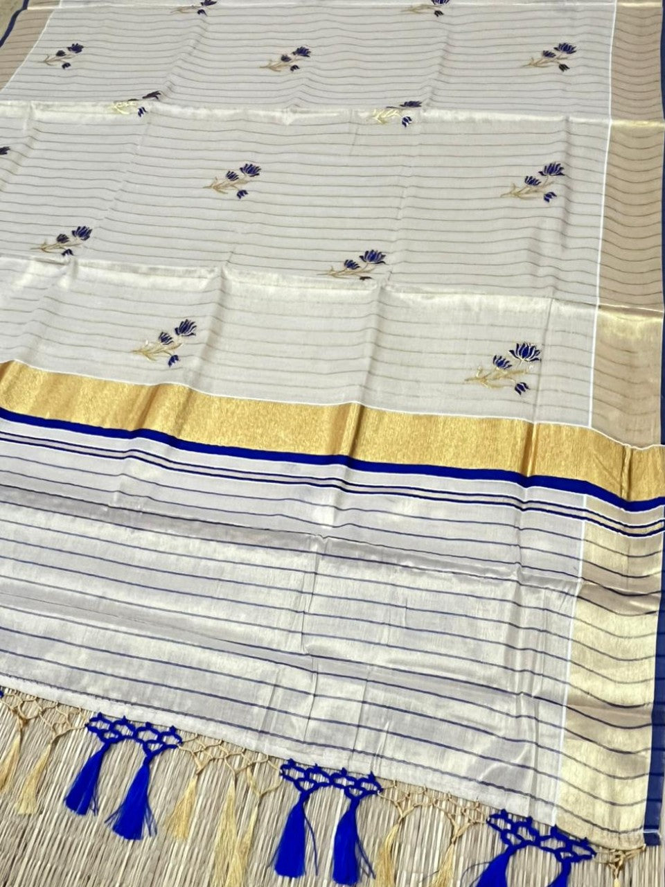 Kerala Tissue Saree With Blue Floral Embroidery Design In SL249