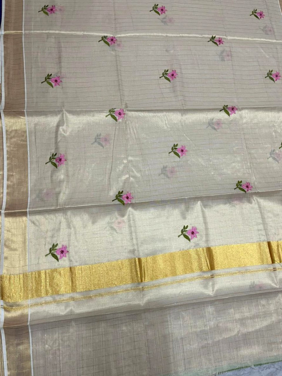 Southloom Kerala Tissue Pink And Green Floral Embroidery Design on the Body With Gold Kasavu