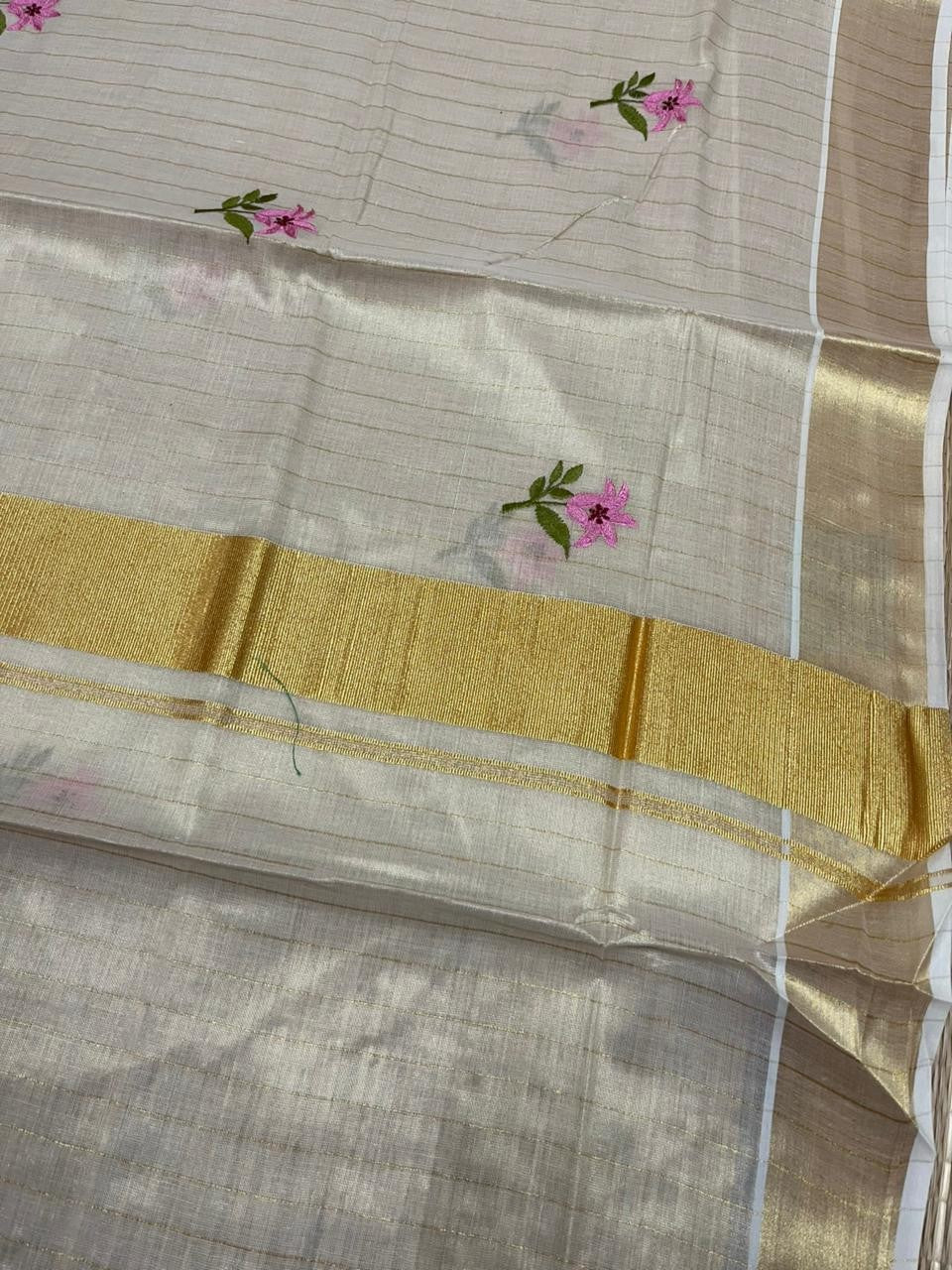 Southloom Kerala Tissue Pink And Green Floral Embroidery Design on the Body With Gold Kasavu