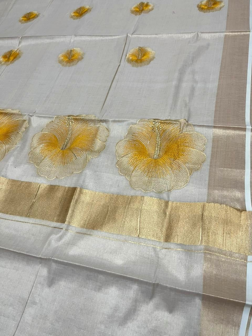 Southloom Kerala Tissue Kasavu Saree with Yellow Floral Embroidery Design on Body SL434