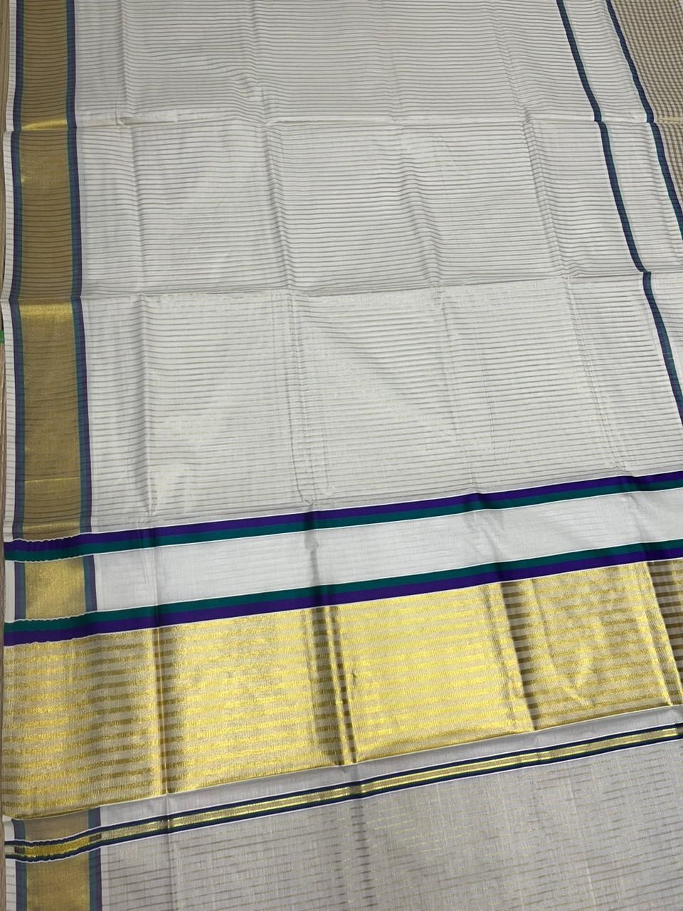 Southloom Kerala Cotton Kasavu Saree with Stripes on Body and Border in Peacock Green And Violet Border SL457