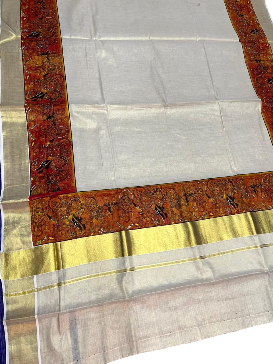 Southloom Kerala Tissue Kasavu Saree with Theyyam Prints And Gold Kasavu Border SL474