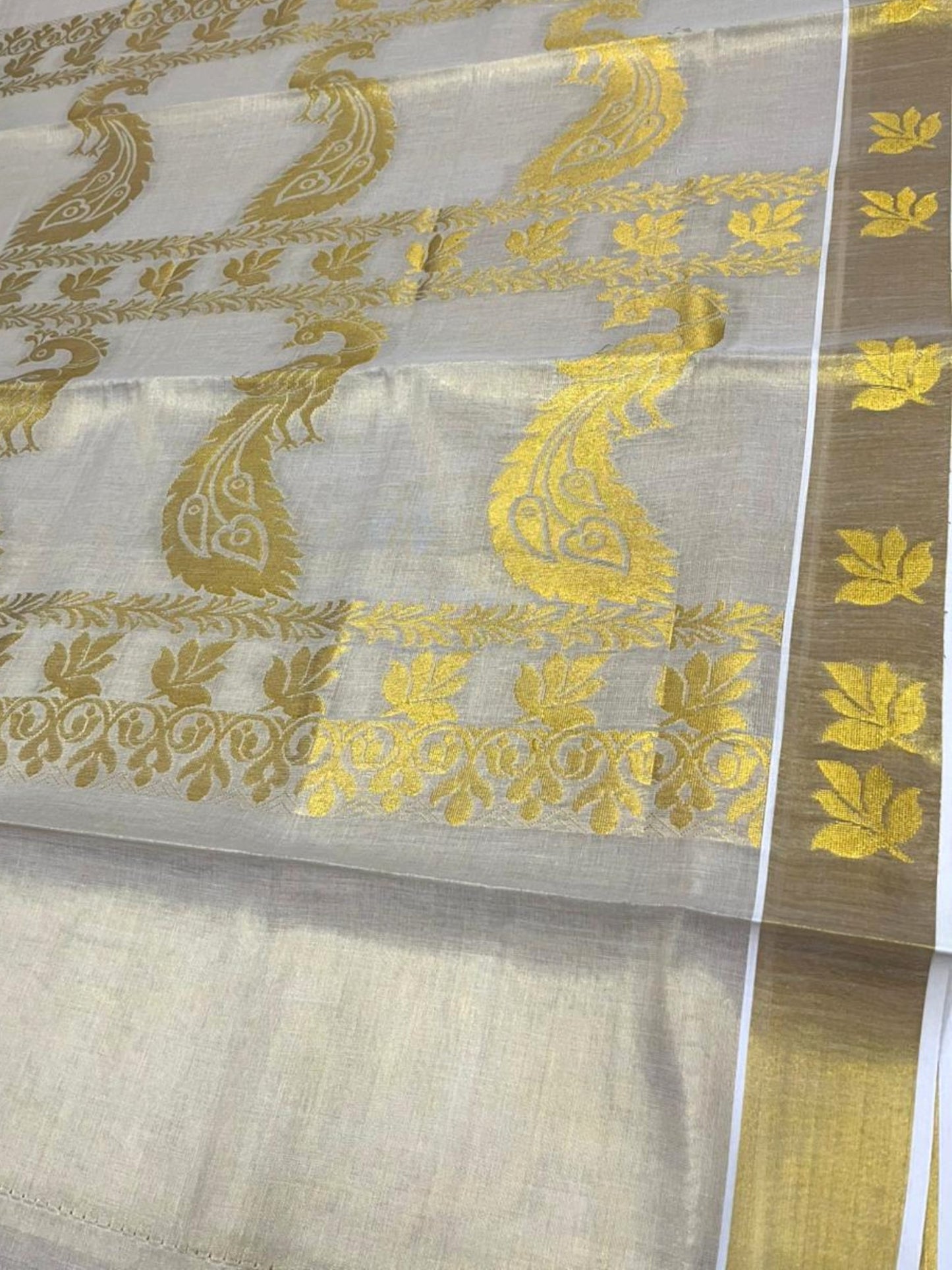 Southloom Tissue Kerala Kasavu Heavy Work Saree with Peacock and Leaf Woven Design on Body and Borders SL479