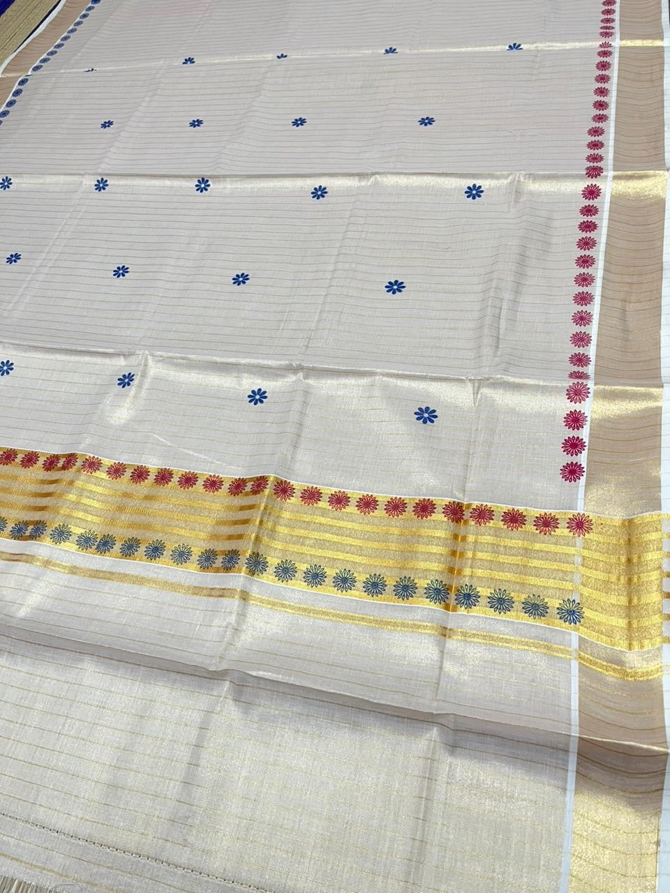Southloom Tissue Kerala Kasavu Saree with Floral Digital Print on Body and Border in Blue & Magenta SL496