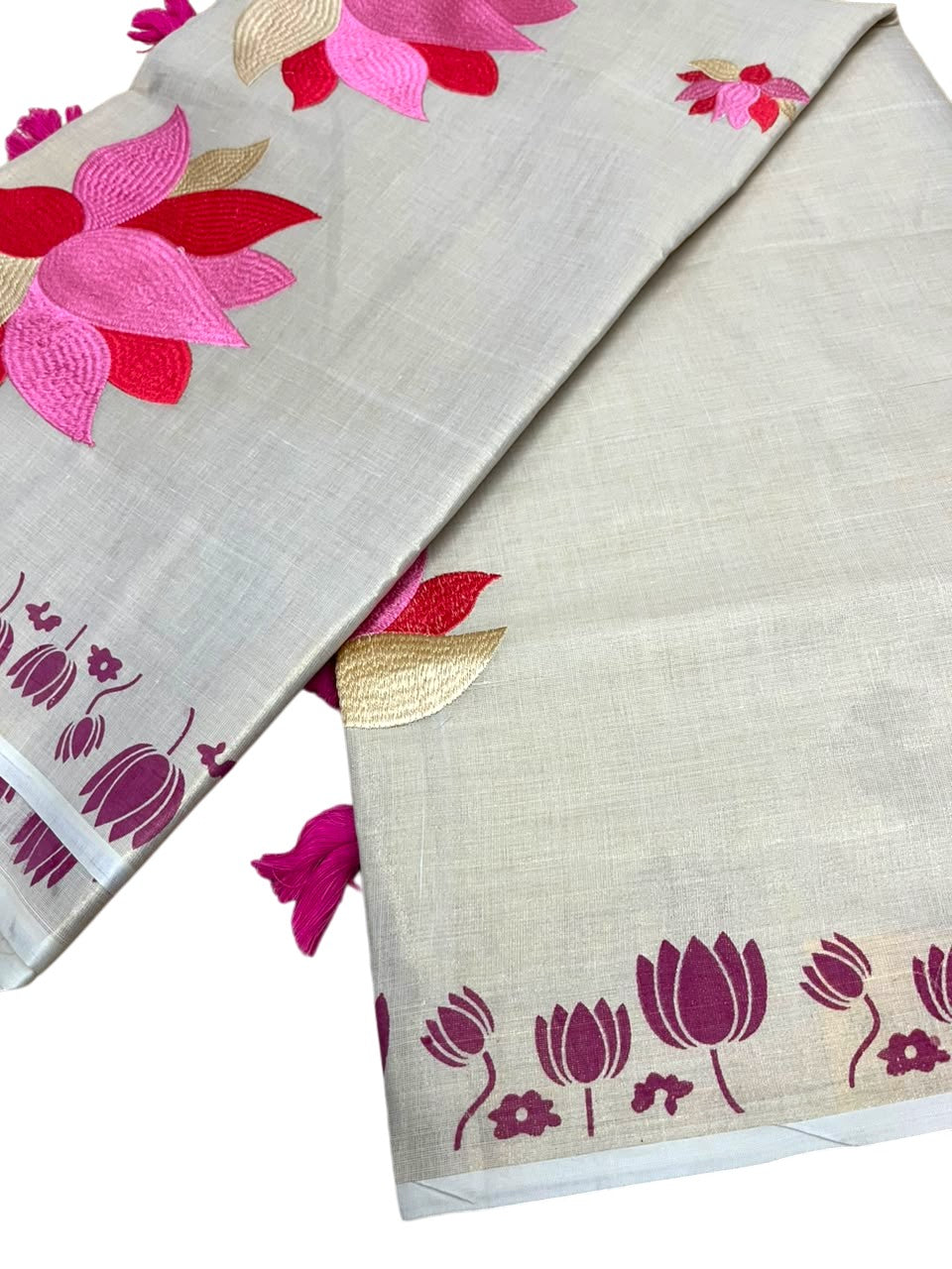 Southloom Kerala Tissue Pink Lotus Embroidery Design on the Body With Pink Tussles SL550