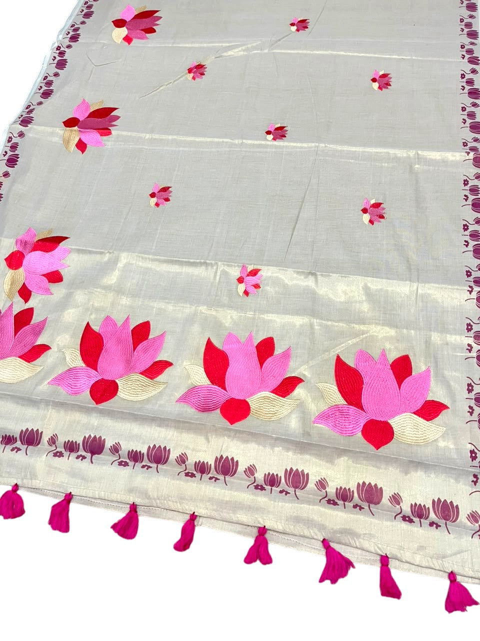 Southloom Kerala Tissue Pink Lotus Embroidery Design on the Body With Pink Tussles SL550