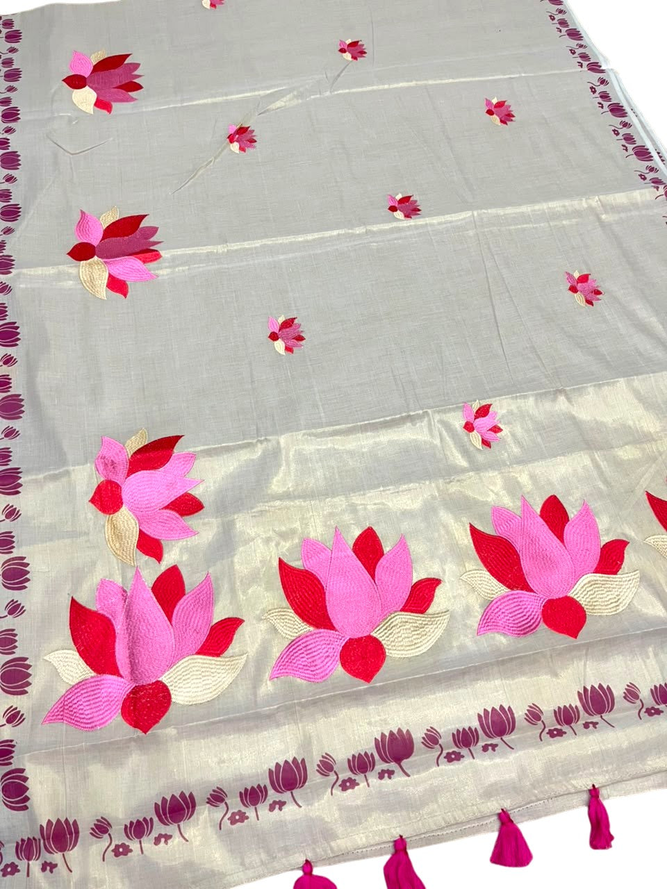 Southloom Kerala Tissue Pink Lotus Embroidery Design on the Body With Pink Tussles SL550