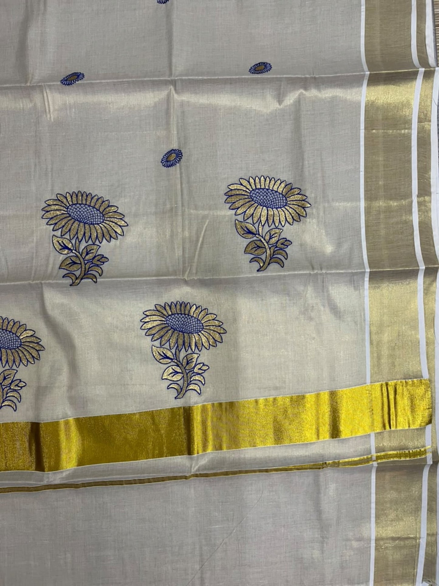 Southloom Kerala Tissue Kasavu Plain Saree with Blue &Gold Floral embroidery work