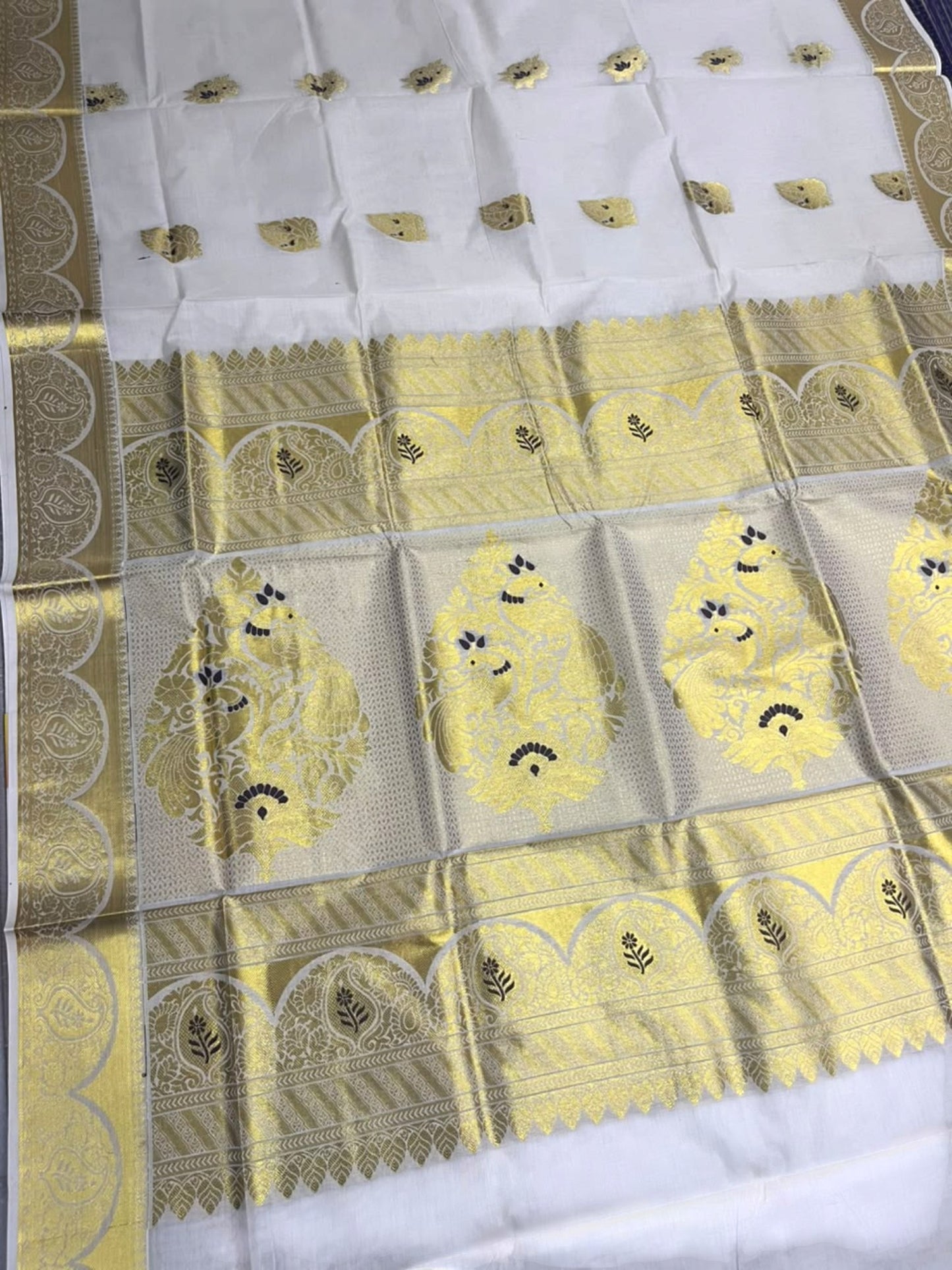 Southloom Tissue Kerala Kasavu Heavy Work  Saree with Peacock  Woven Design on  Borders
