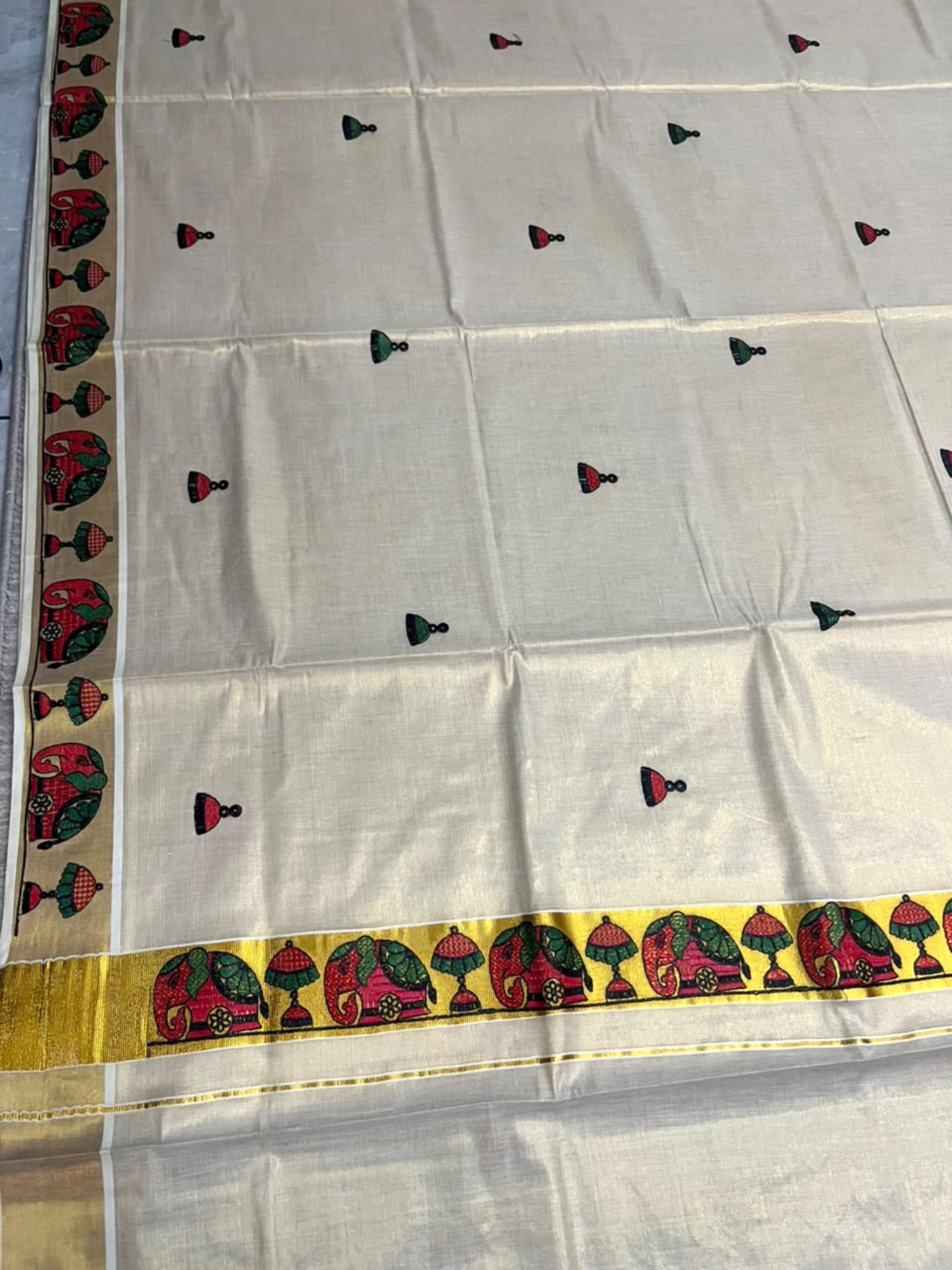 Southloom Tissue Kerala Kasavu Saree with Elephant Embroidery Design