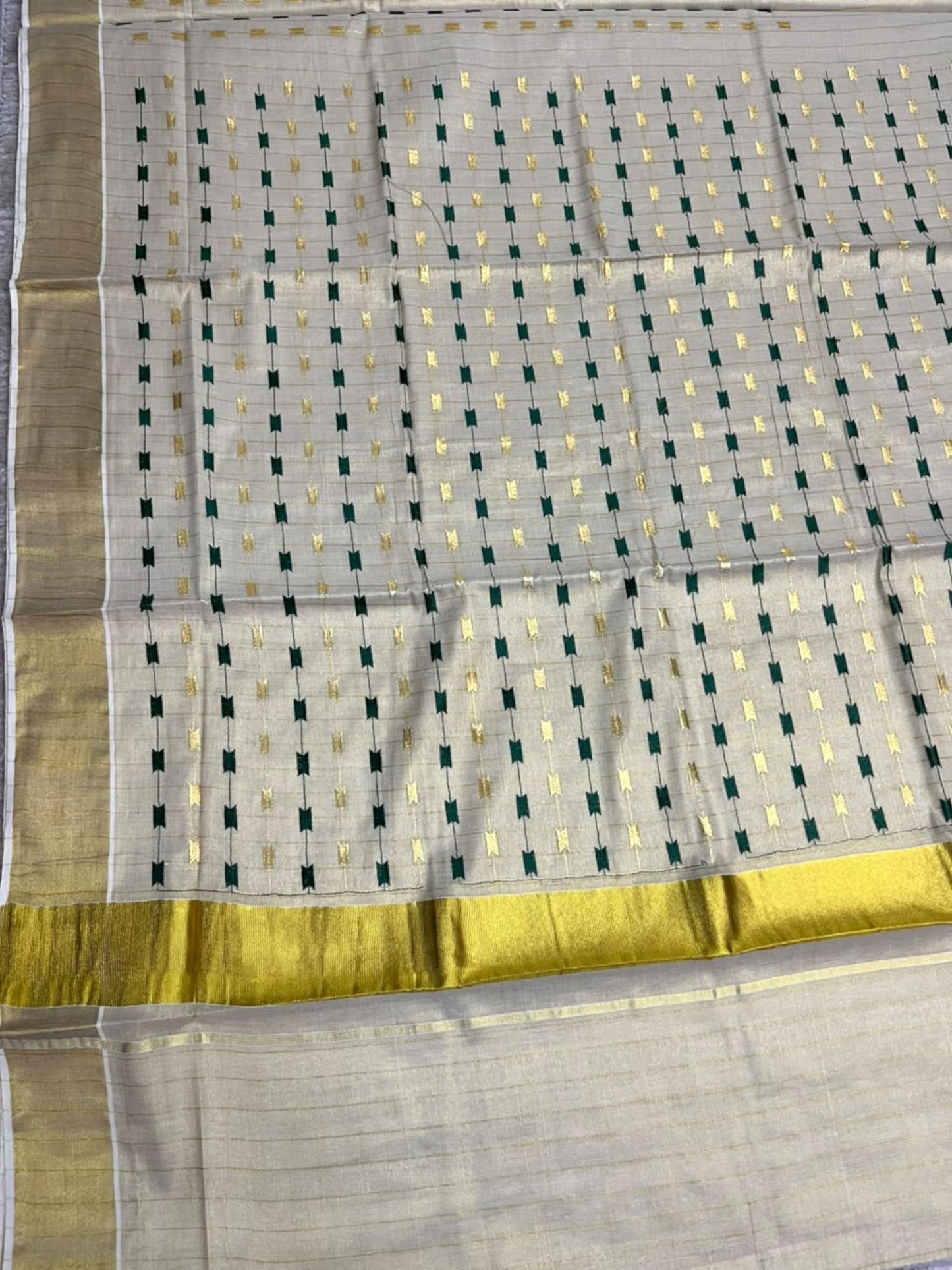 Southloom Tissue Kerala Kasavu Saree with Green & Gold Embroidery Designs on Body