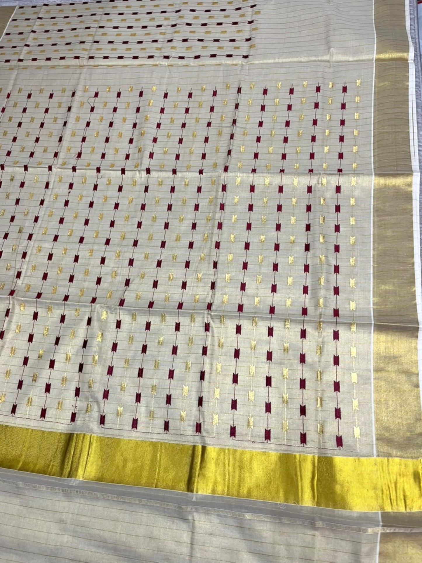 Southloom Tissue Kerala Kasavu Saree with Maroon& Gold Embroidery Designs on Body