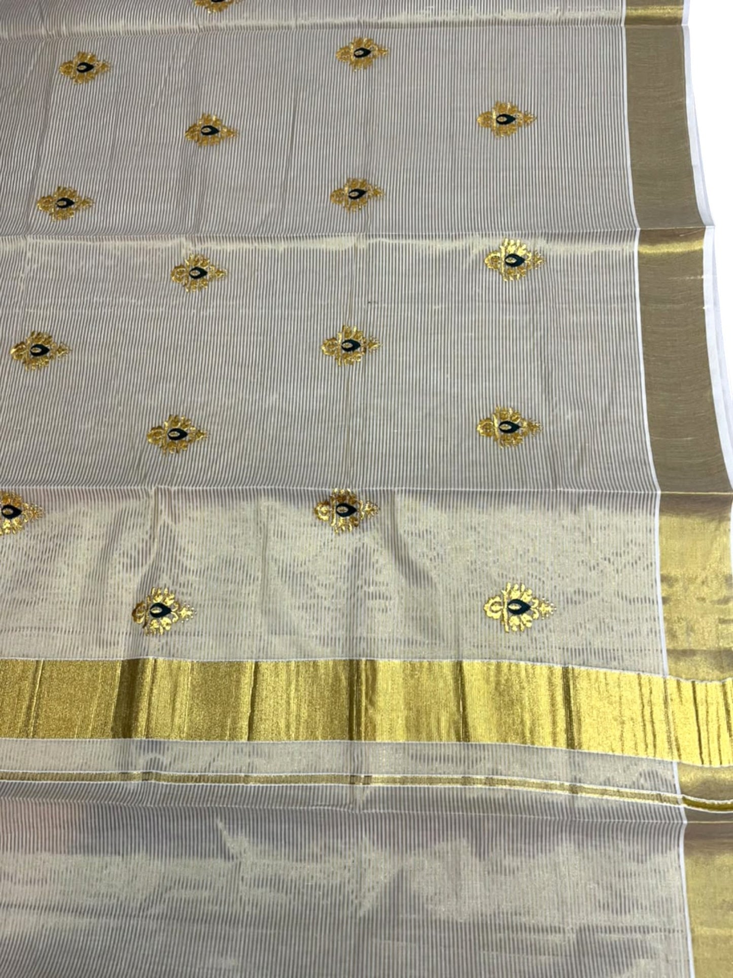 Southloom Tissue Kerala Kasavu Saree with Green & Gold Embroidery Designs on Body