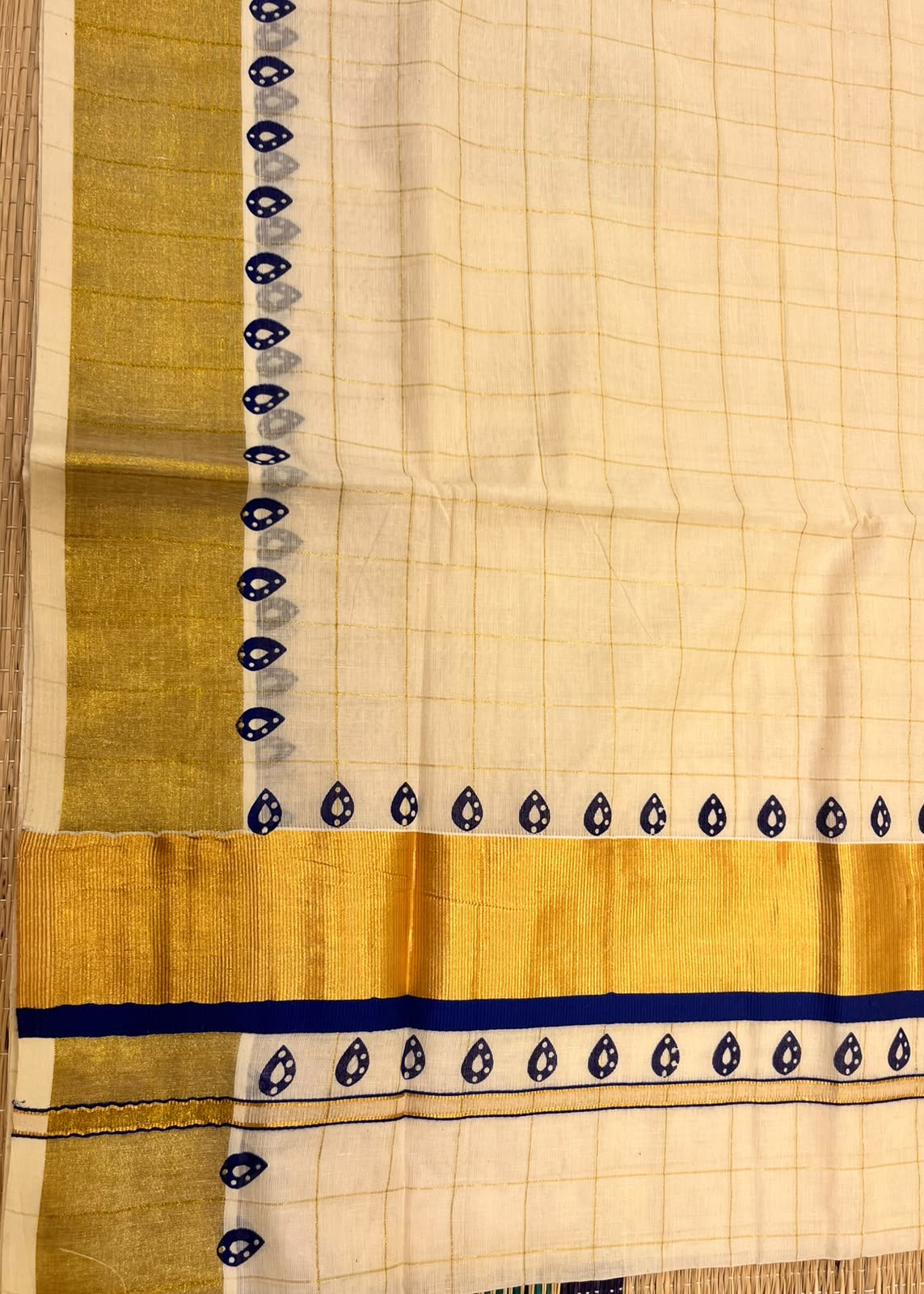 Southloom Kerala Cotton Kasavu Saree With Check Design On Body And Blue Prints On Borders