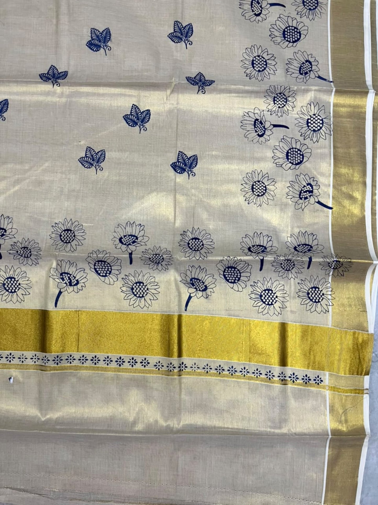 Southloom Kerala Tissue Kasavu Plain Saree with Blue Floral Printed work On Border