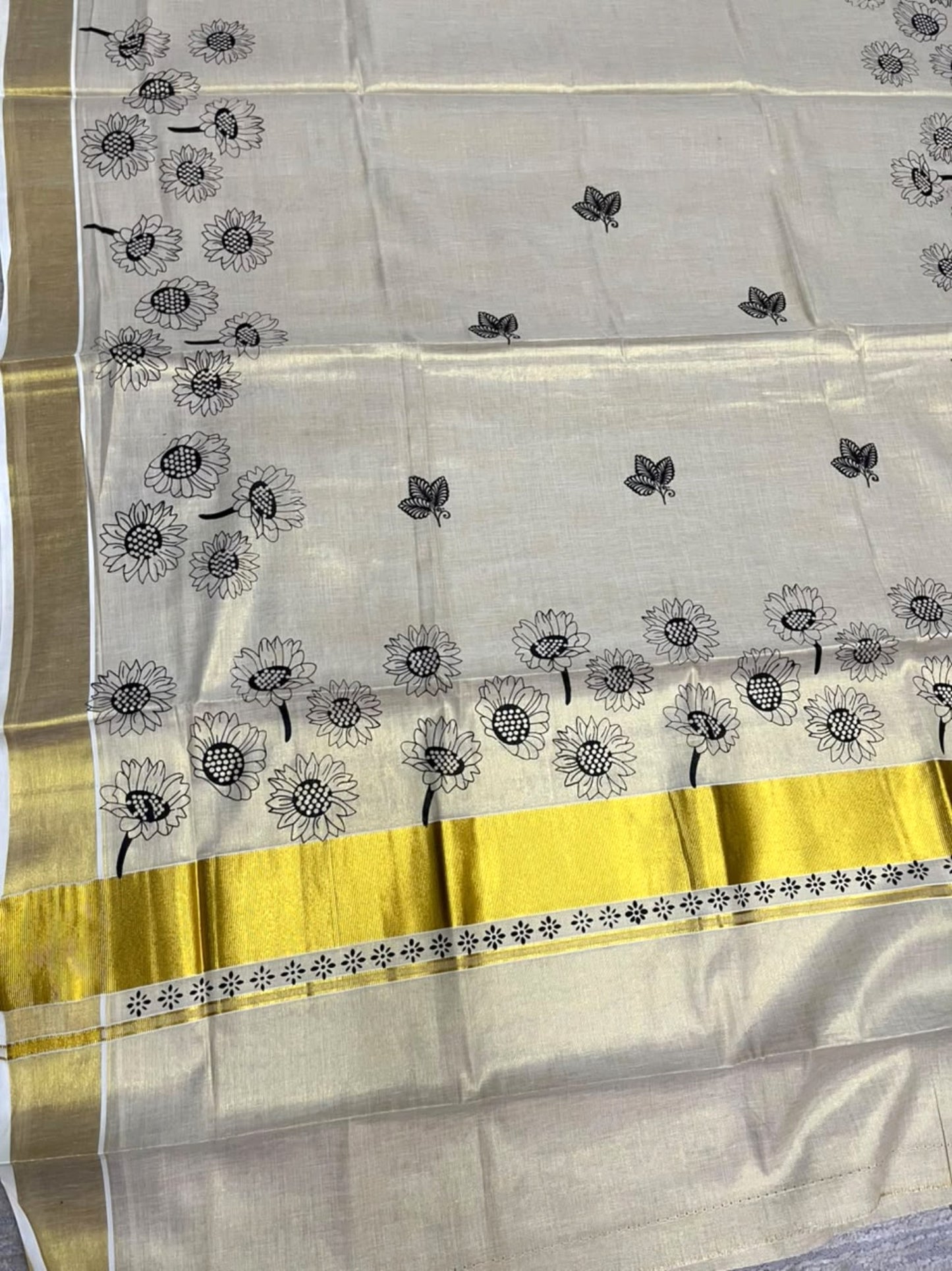 Southloom Kerala Tissue Kasavu Plain Saree with Black Floral Printed work On Border