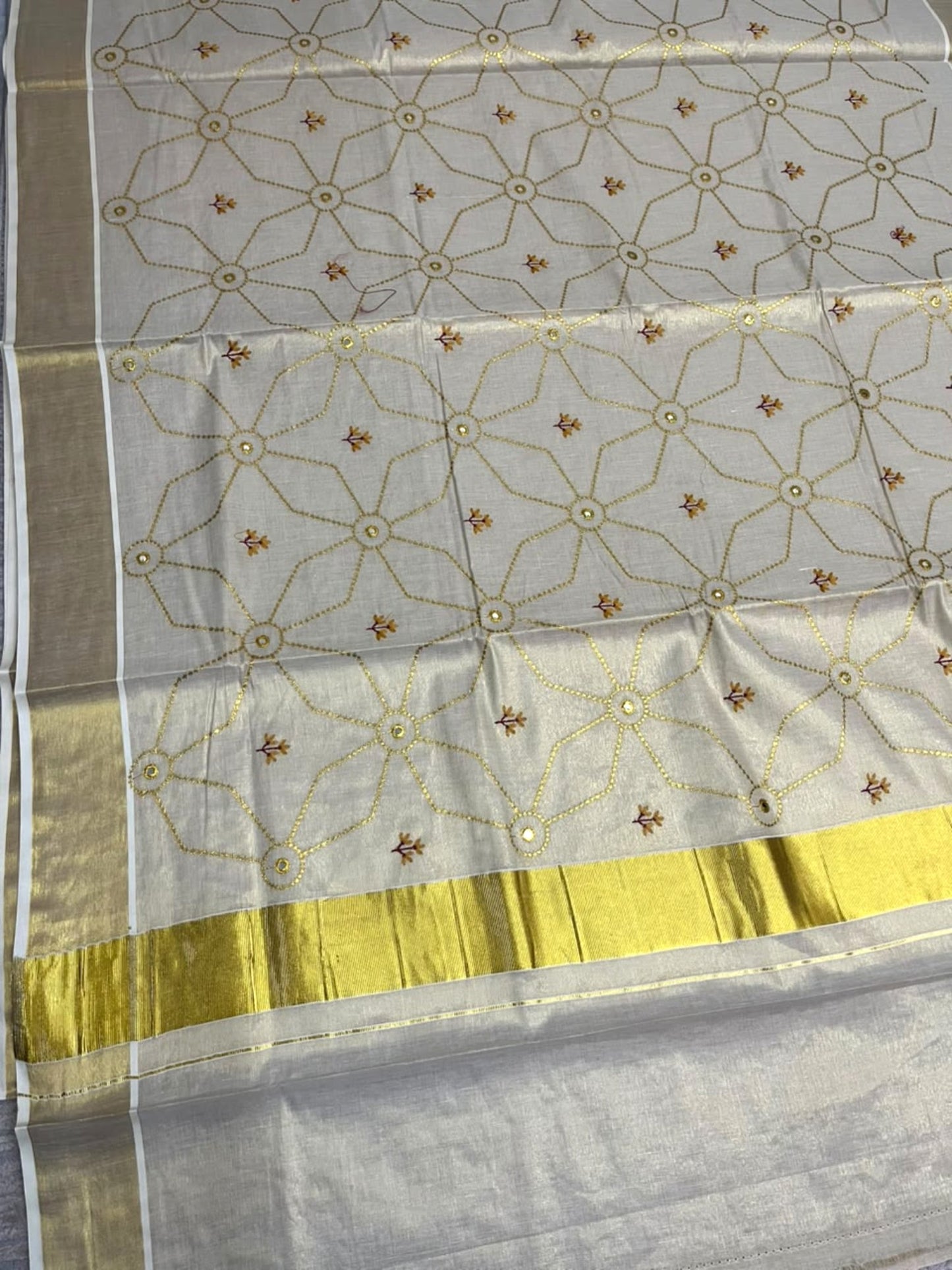 Southloom Kerala Tissue Kasavu Saree with Floral Embroidery Work on Body in Yellow