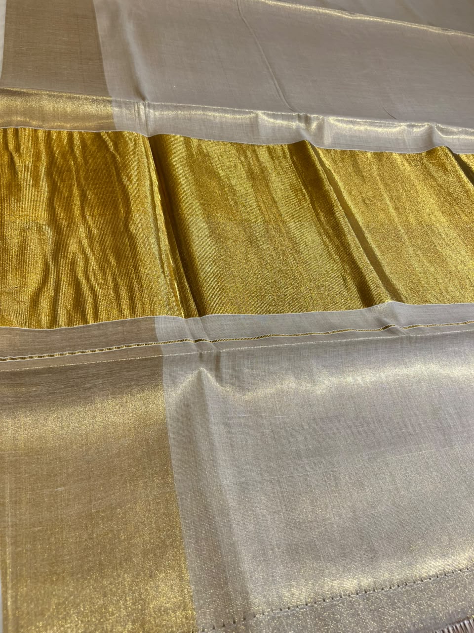 Southloom Kerala Tissue Saree With Kasavu Borders And 10 Inch Borders On The Pallu
