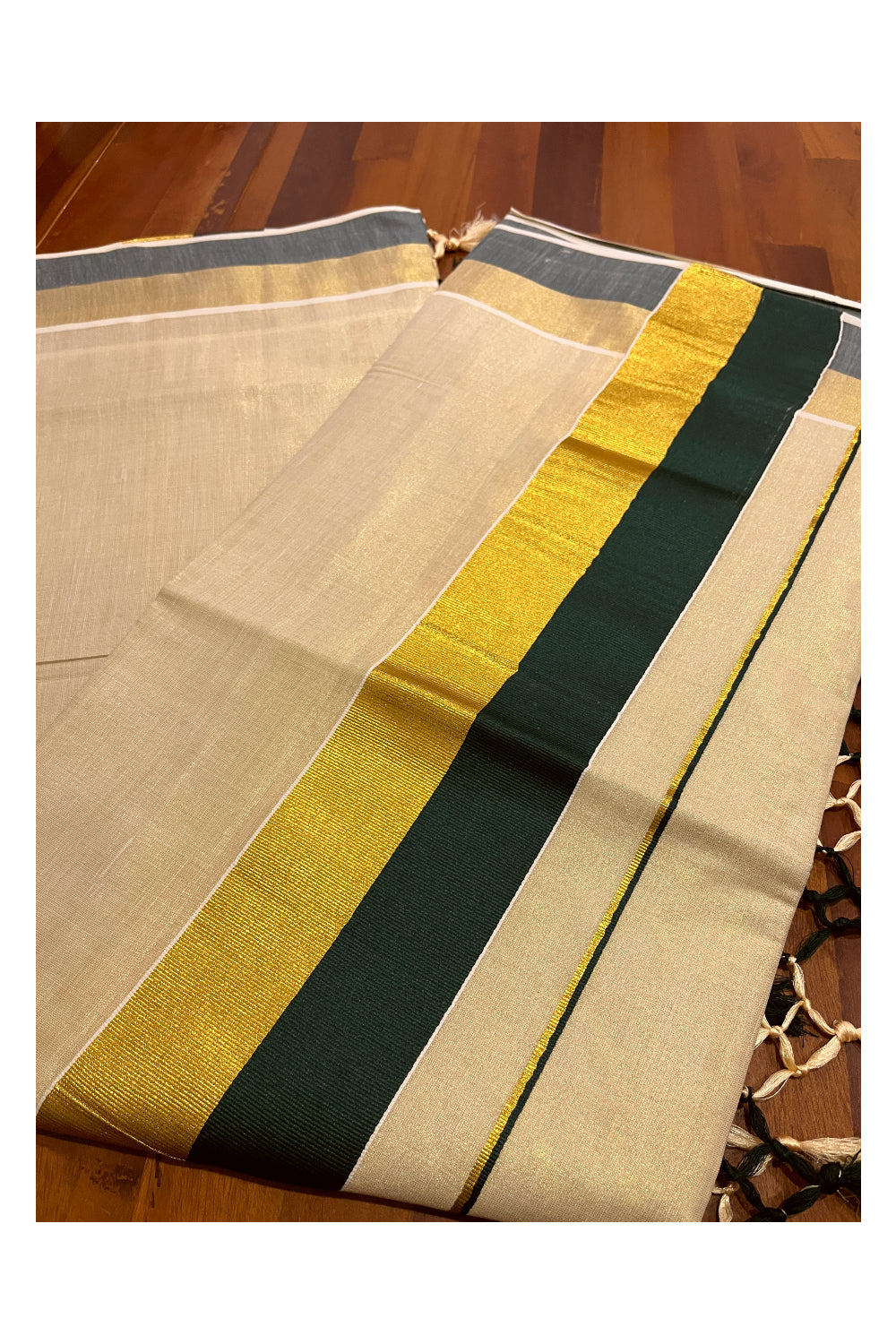 Kerala Tissue Kasavu Plain Saree with Kasavu and Green Border