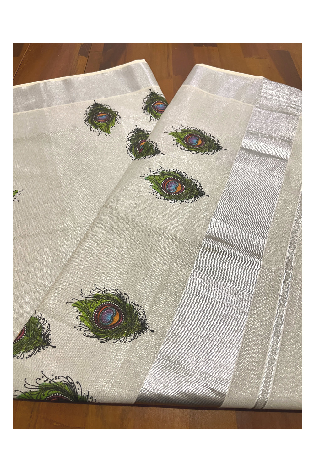 Kerala Silver Tissue Kasavu Saree with Feather Mural Printed Design