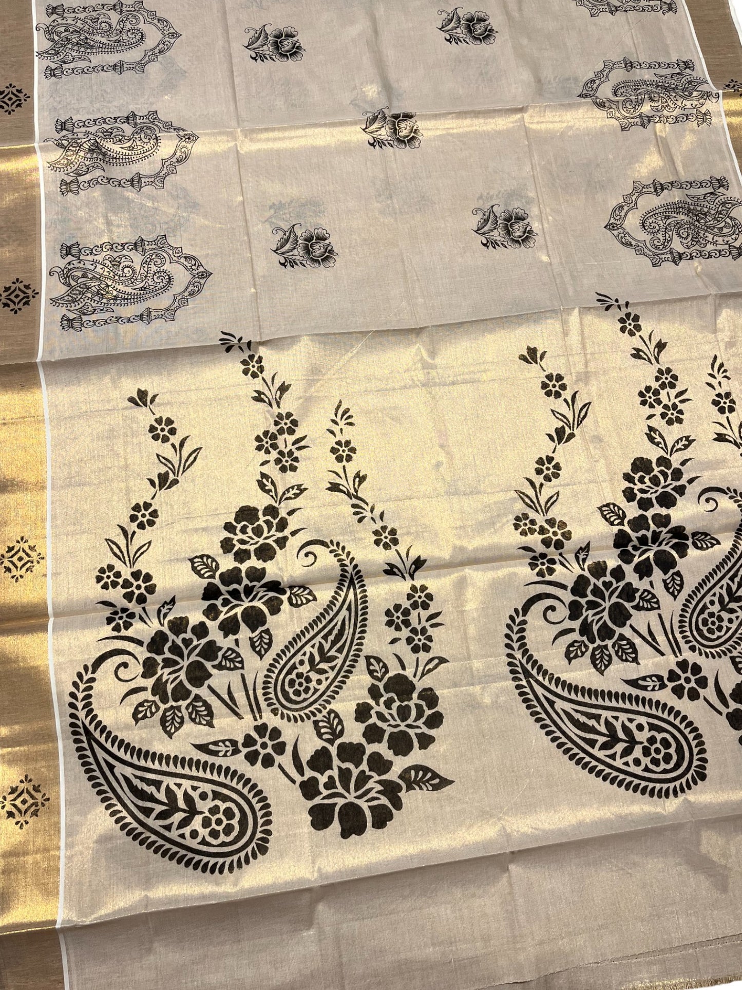 Kerala Tissue Kasavu Saree with Black Floral Block Printed Designs