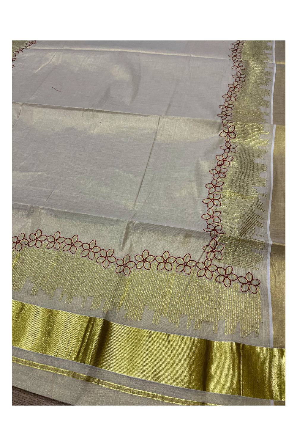 Kerala Kasavu Tissue Saree with Floral Thread works on Border