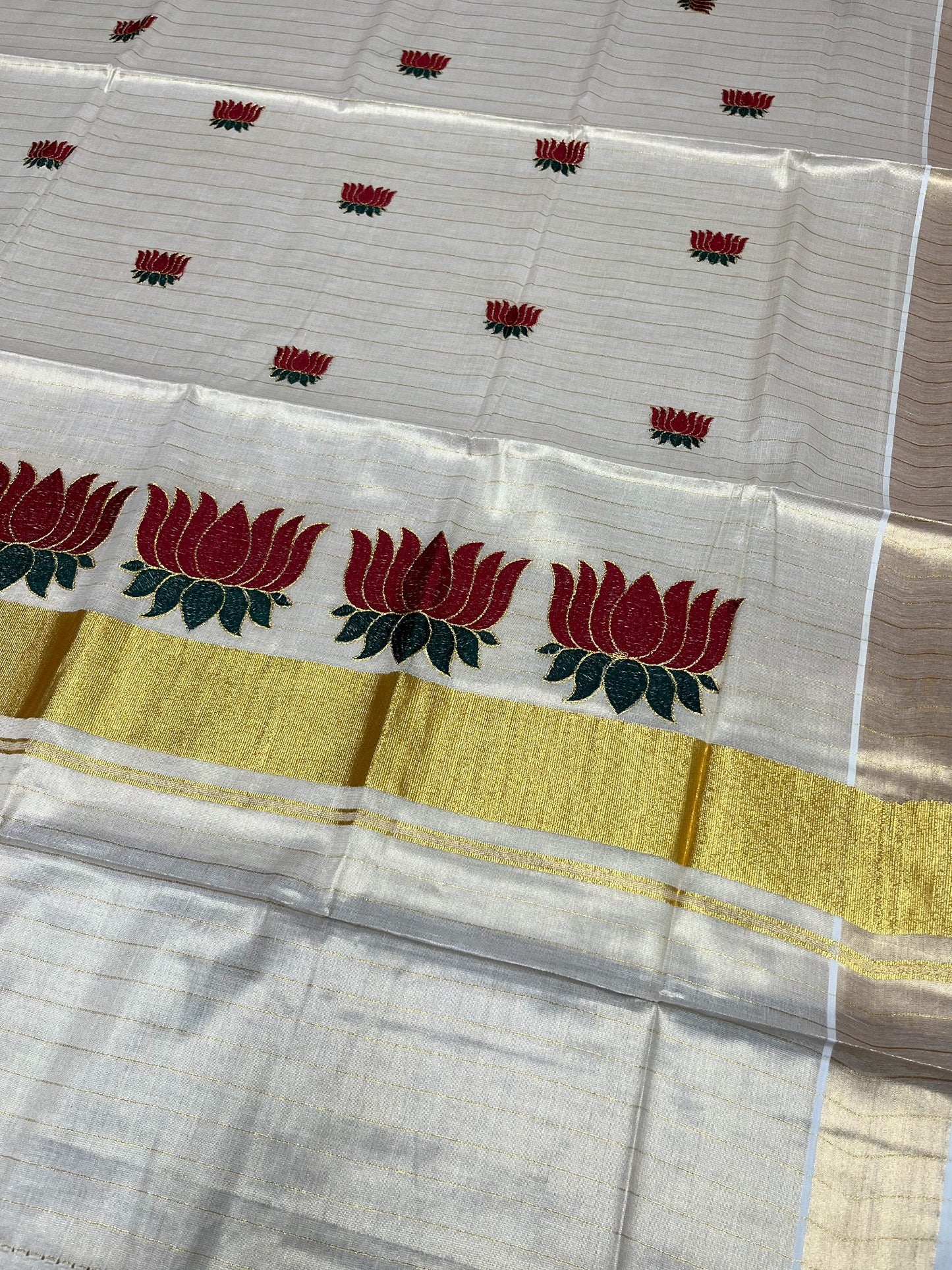 Southloom Kerala Tissue Lines Kasavu Saree with Maroon And Green Lotus Embroidery Works