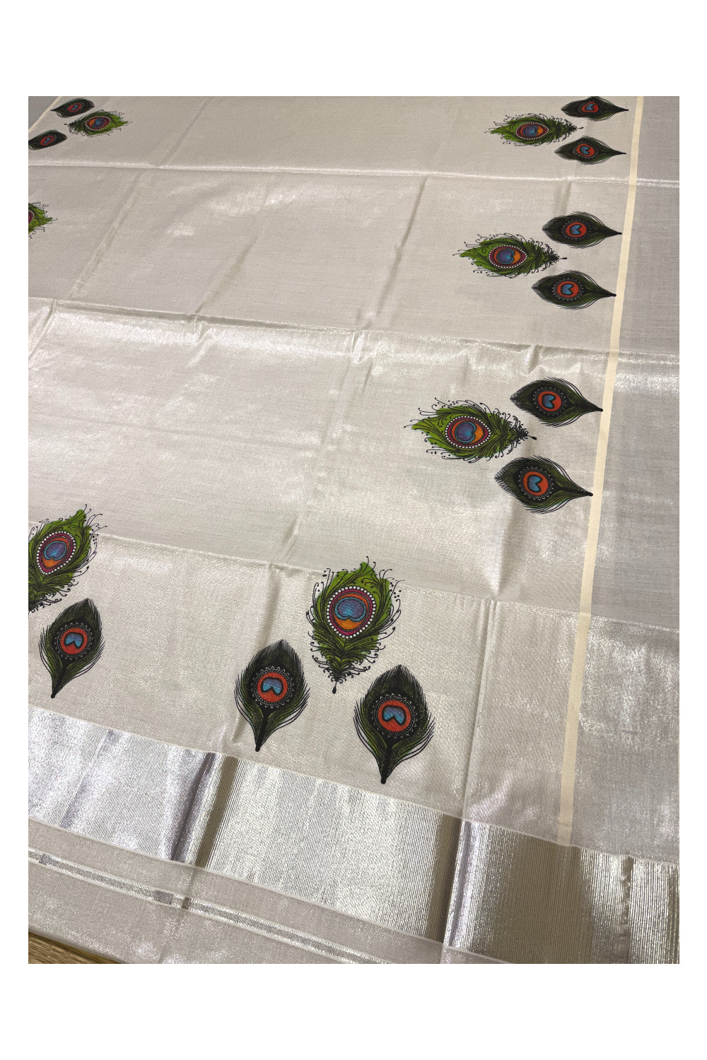 Kerala Silver Tissue Kasavu Saree with Feather Mural Printed Design