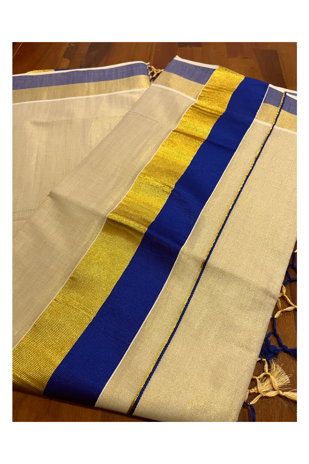 Kerala Tissue Kasavu Plain Saree with Kasavu and Blue Border