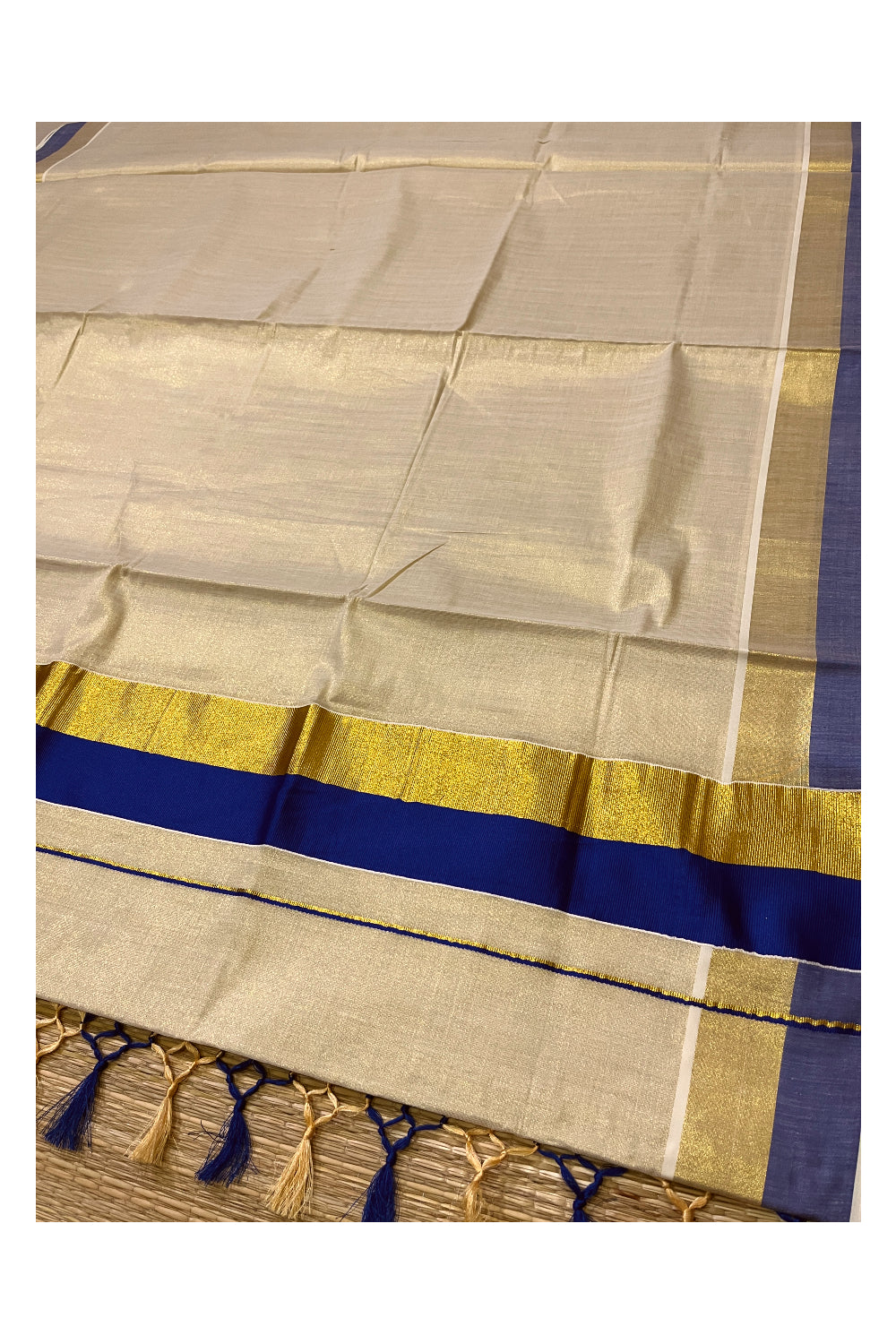 Kerala Tissue Kasavu Plain Saree with Kasavu and Blue Border