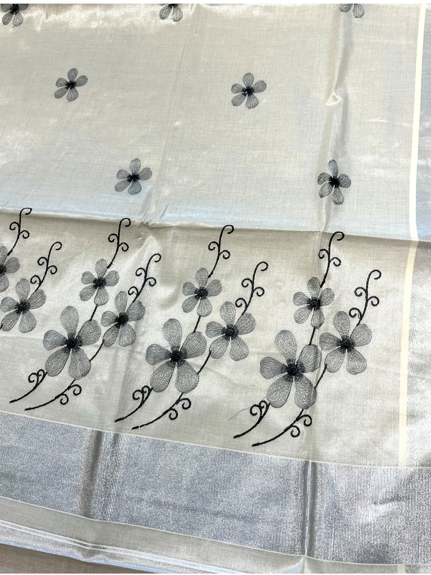 Southloom Kerala Tissue Silver Kasavu Saree with Grey Floral Embroidery on Body and Border
