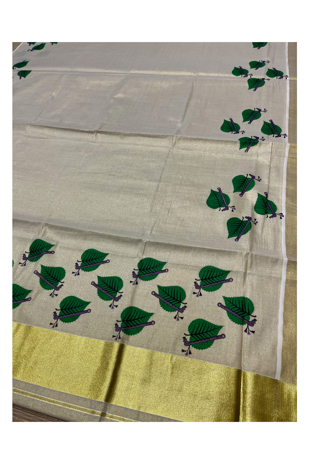 Kerala Tissue Kasavu Saree with Leaf Block Printed Designs