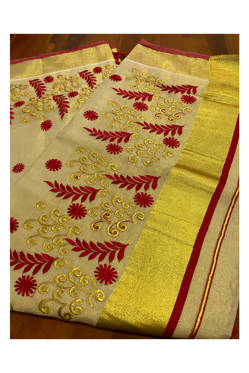 Kerala Tissue Kasavu Heavy Work Saree with Golden and Red Leaf Embroidery Design