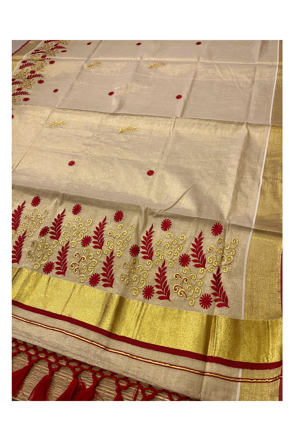 Kerala Tissue Kasavu Heavy Work Saree with Golden and Red Leaf Embroidery Design