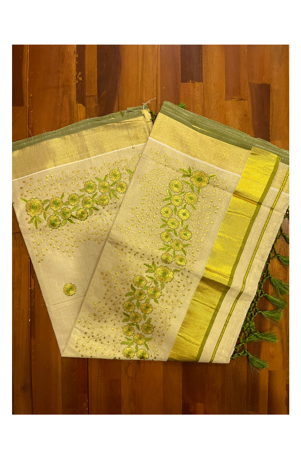 Kerala Tissue Kasavu Heavy Work Saree with Golden and Green Floral Embroidery Design