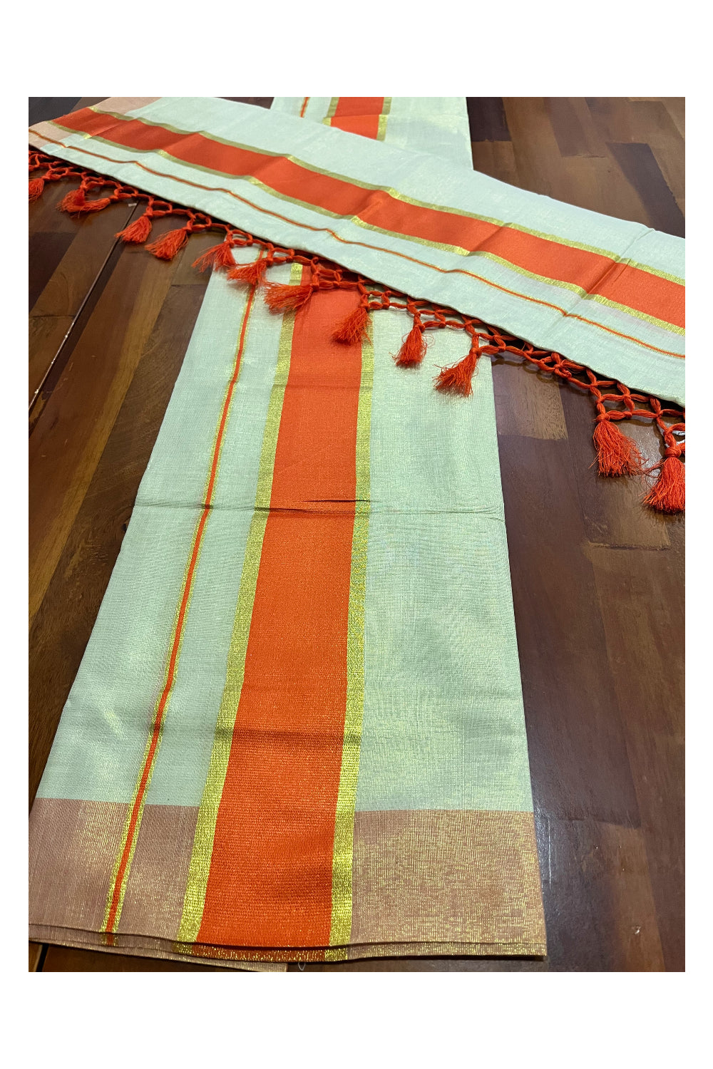 Kerala Tissue Kasavu Set Mundu (Mundum Neriyathum) with Orange Kara and Tassels on Pallu 2.50 Mtrs