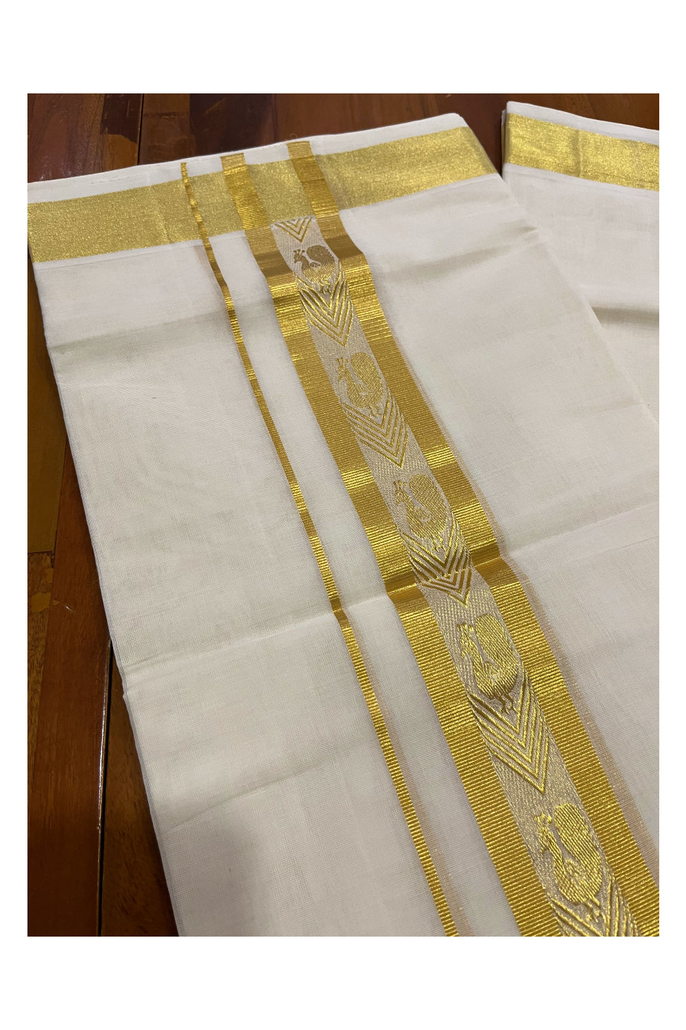 Southloom Premium Handloom Cotton Mundu with Kasavu Peacock Woven Border