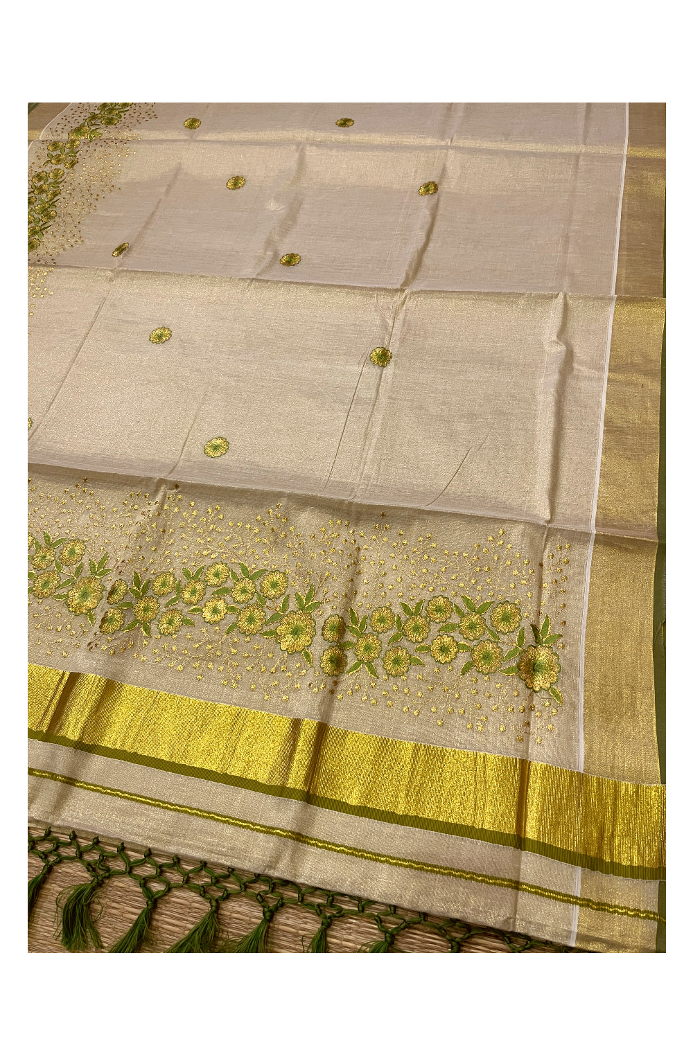 Kerala Tissue Kasavu Heavy Work Saree with Golden and Green Floral Embroidery Design