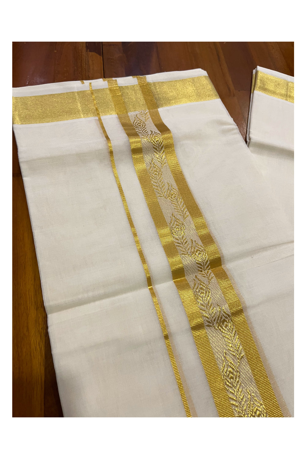 Southloom Premium Handloom Cotton Mundu with Kasavu Feather Woven Border