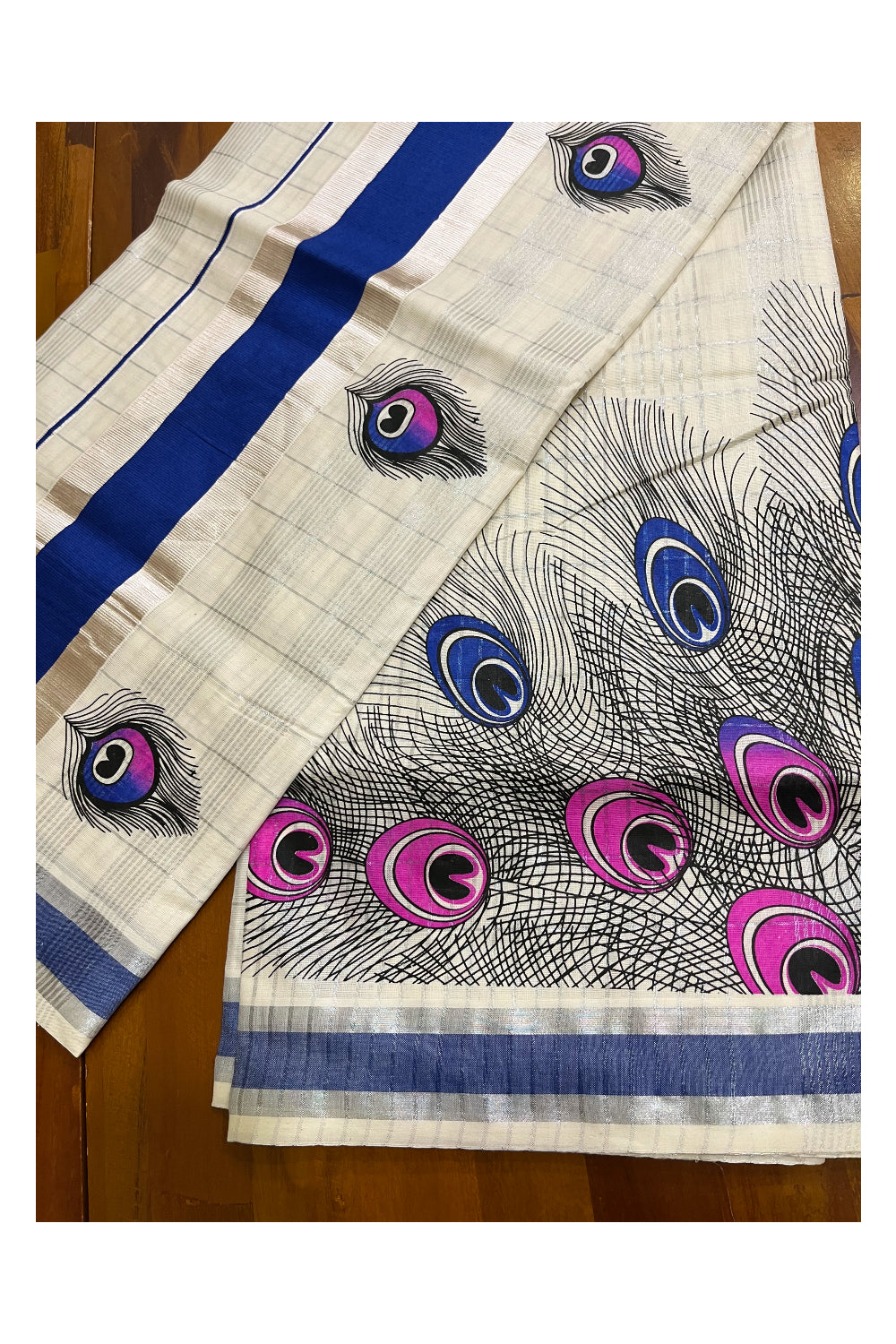 Pure Cotton Kerala Saree with Silver Kasavu Checks and Feather Block Prints on Blue Border