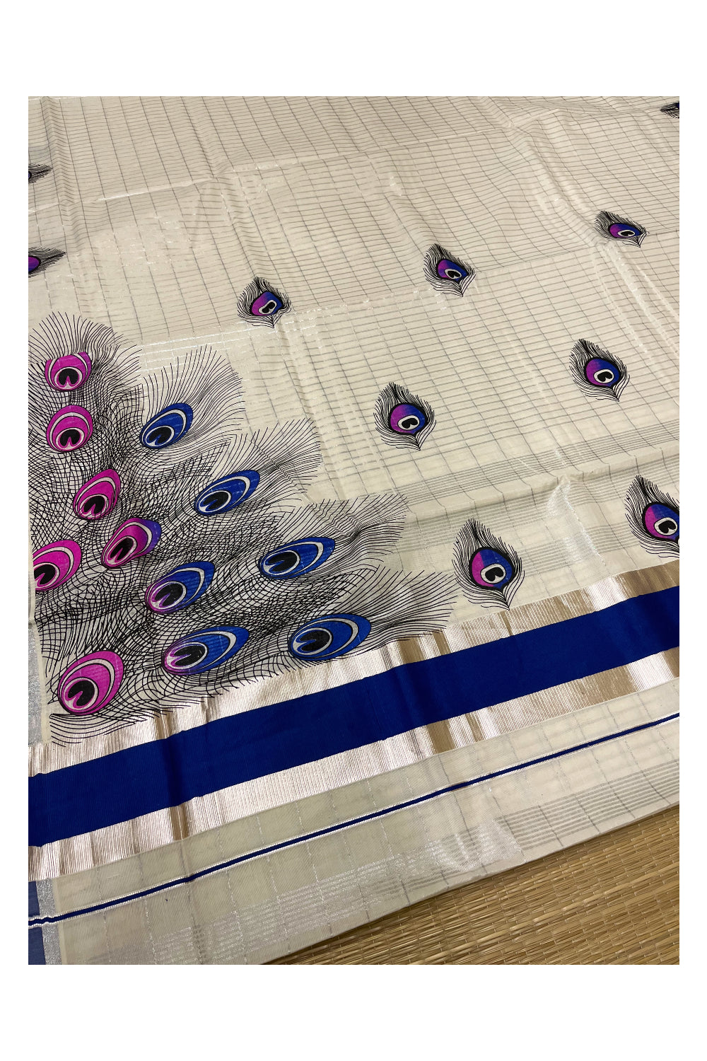 Pure Cotton Kerala Saree with Silver Kasavu Checks and Feather Block Prints on Blue Border