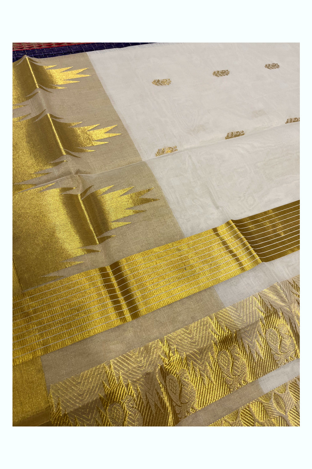 Southloom Premium Handloom Cotton Kasavu Saree with Big Temple Woven Designs on Border (Vishu 2024 Collection)