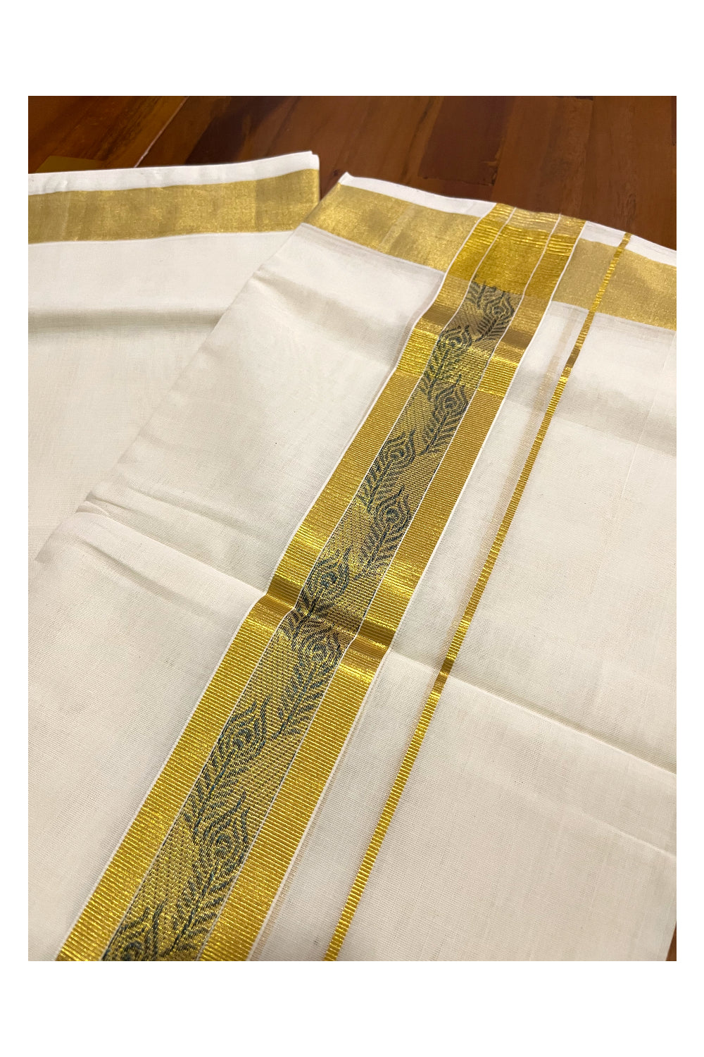 Southloom Premium Handloom Pure Cotton Mundu with Kasavu and Blue Feather Woven Border (Onam Mundu 2023)