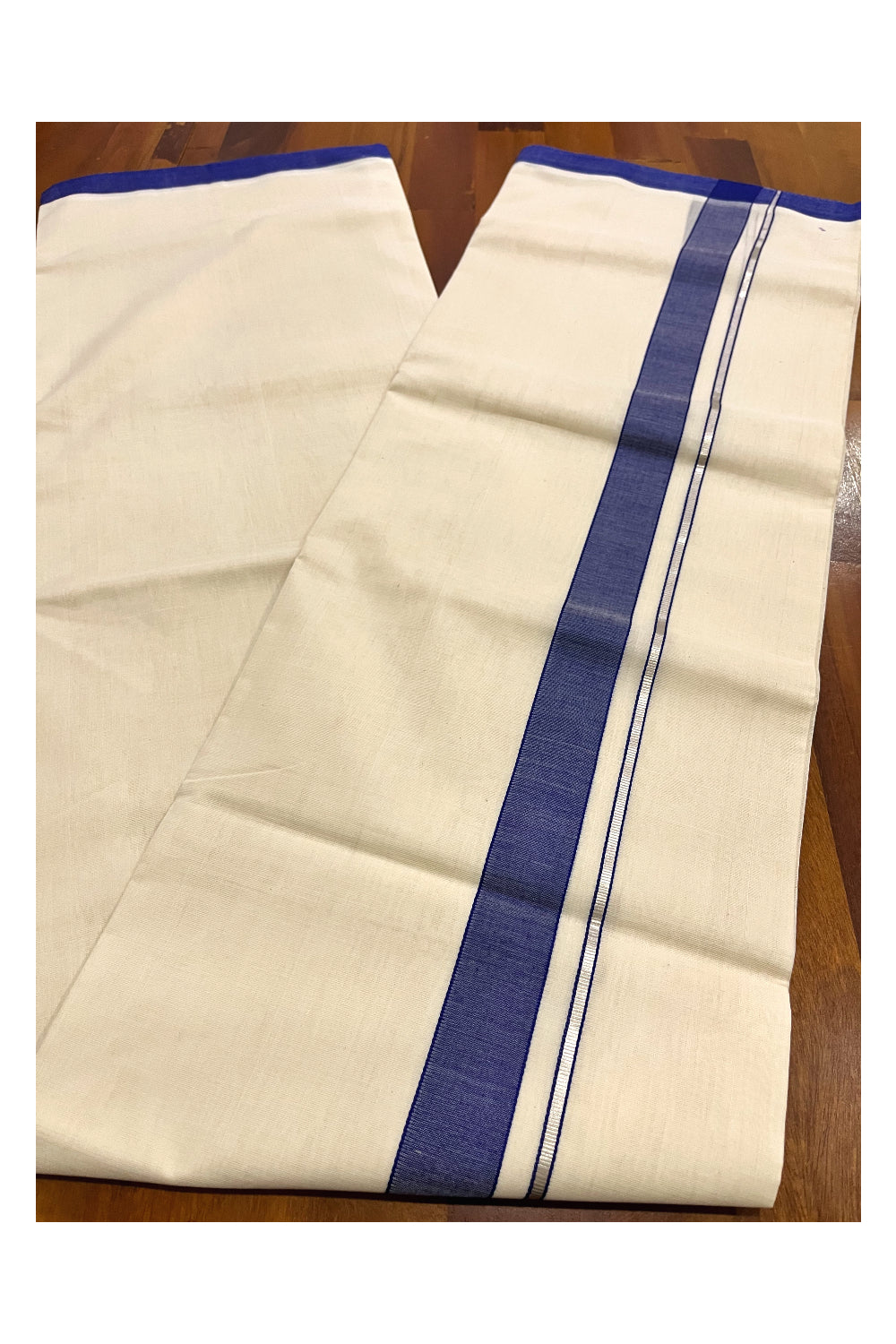 Southloom Premium Balaramapuram Unakkupaavu Handloom Mundu with Blue and Silver Kasavu Border (South Indian Kerala Dhoti)