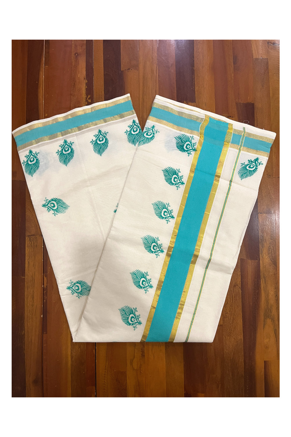 Pure Cotton Kerala Saree with Turquoise Feather Block Prints and Kasavu Border