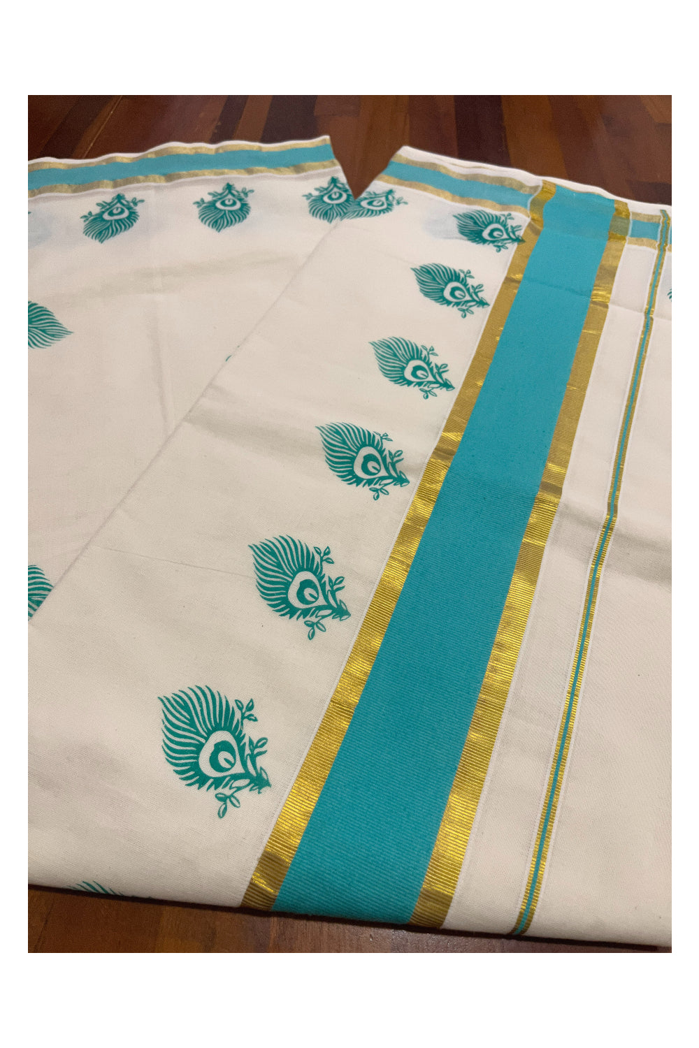 Pure Cotton Kerala Saree with Turquoise Feather Block Prints and Kasavu Border